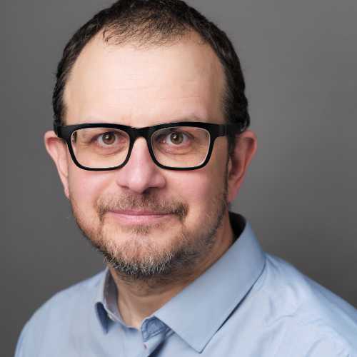 Linkedin portrait photo with grey backdrop